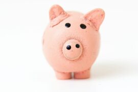 pink pig figurine on white surface {{brizy_dc_image_alt imageSrc=